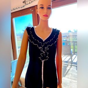 ISABELLA RODRIGUEZ Black & white ruffled blouse size small